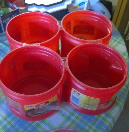 Using Coffee Tubs for Fabric Storage - clear packing tape holding the cans together at top