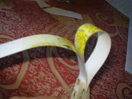 Upcycled Calendar Valentine's Heart Wreath - glue bottom of strips to center fold to make heart and let dry, can be clipped with clothespin