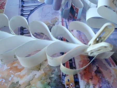 Upcycled Calendar Valentine's Heart Wreath - once dry begin placing bottom of heart into top of next, make two chains of approximately 20 hearts