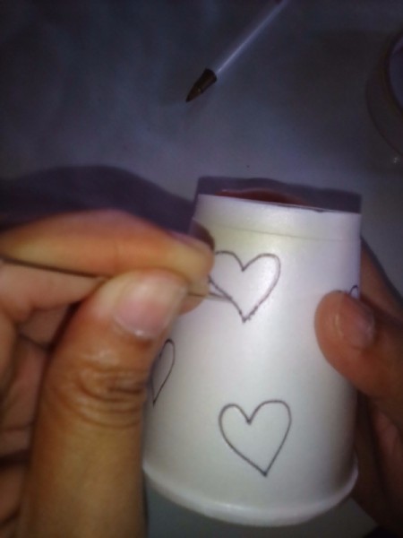 Heart Shapes Flashlight Cover - use a needle to prick and cut out the shape