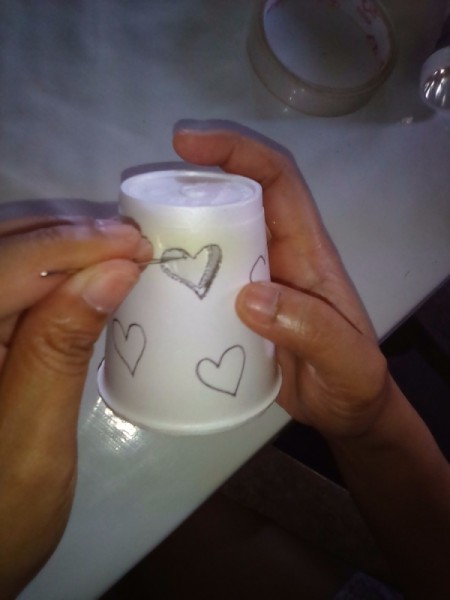 Heart Shapes Flashlight Cover - continuing to prick