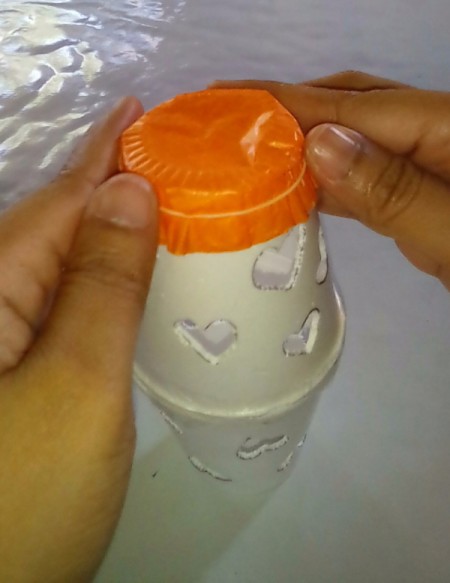 Heart Shapes Flashlight Cover - rubber band holding on paper