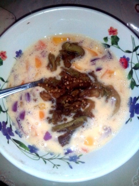 adding eggplant to egg mixture