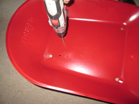 Toy Wheelbarrow as Flower Planter - drilling drainage holes