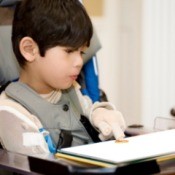 A disabled student studying in a wheelchair.