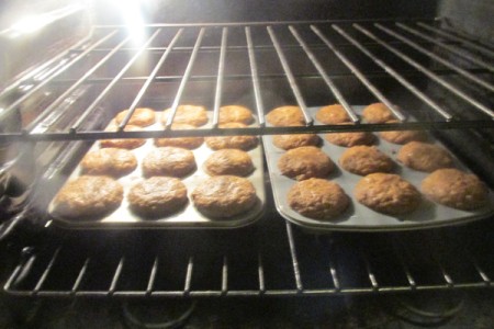 muffins baking in oven