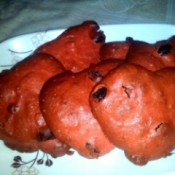 heart shaped, red cookies on plate