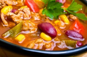 A country stew with tomatoes, kidney beans and corn.