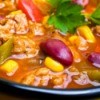 A country stew with tomatoes, kidney beans and corn.