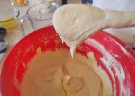 spooning batter in bowl