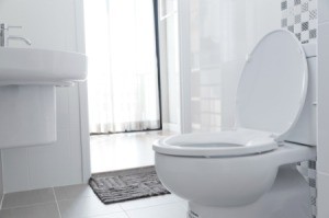 A clean white toilet in a home.