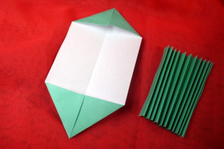 Pleated Paper Butterfly - fold four corners to the center on wrong side of paper