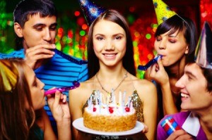 Teens celebrating at a birthday party.