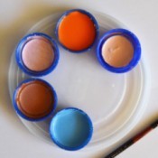 Recycled Milk Bottle Caps Palette - paint in bottle caps on lid palette