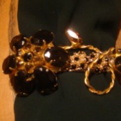 Recycled Jewelry Barrettes - barrette decorated with floral jewelry piece with dark topaz like stones