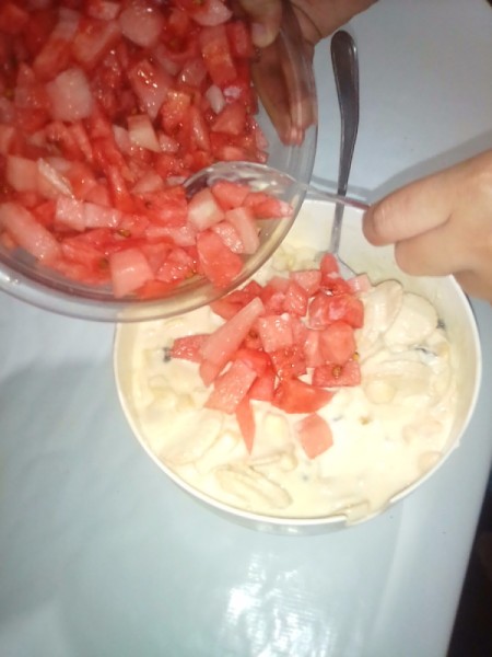 adding watermelon to bowl