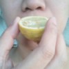 Lemon as Substitute for Smelling Salts - person inhaling lemon
