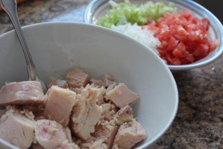 bowl of tuna chunks and bowl of chopped vegetables