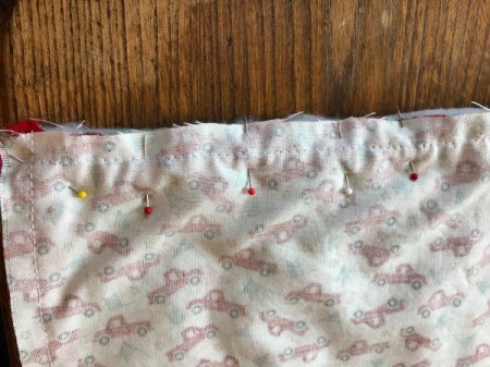 Whole Cloth Tied Quilt with Ric Rac Trim - seam pinned with the stitching for the ric rac visible