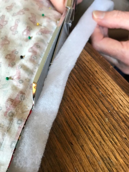 Whole Cloth Tied Quilt with Ric Rac Trim - pin seam and cut off excess batting