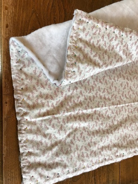 Whole Cloth Tied Quilt with Ric Rac Trim - fabric pieces with right sides together and batting stack