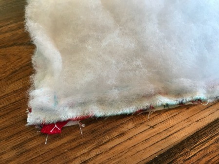 Whole Cloth Tied Quilt with Ric Rac Trim - excess batting removed from seam allowance