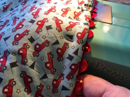 Whole Cloth Tied Quilt with Ric Rac Trim - finger press seam and pin