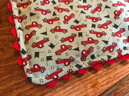 Whole Cloth Tied Quilt with Ric Rac Trim - view of top stitching