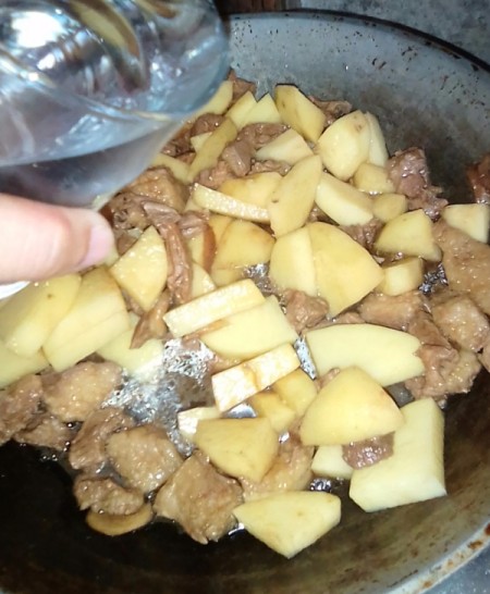 adding water to skillet