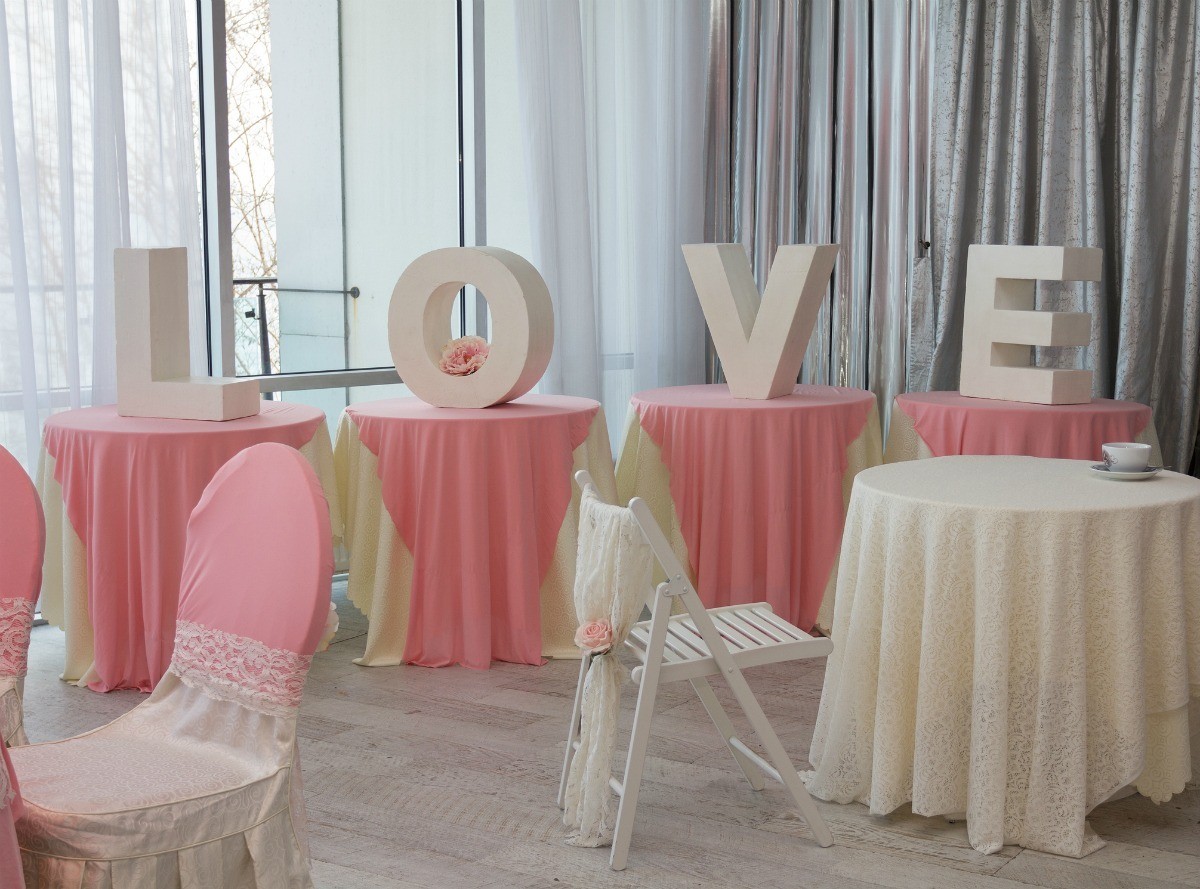Covering Up Hall Decorations for a Wedding Reception | ThriftyFun