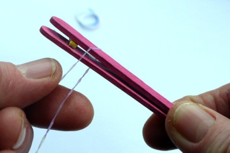 Popsicle Stick Toy Harmonica - secure each end with an elastic band