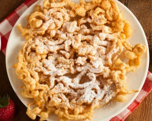 Funnel cake, made by deep drying cake batter.
