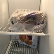 A loaf of bread in the freezer.