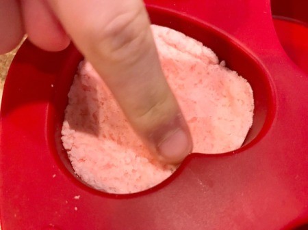 Homemade Bath Bombs - optional method press mixture into heart shaped muffin pan