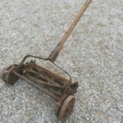 Age and Value of Antique Lawnmower - mower in driveway