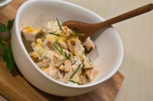 A bowl of chicken salad made with rosemary.