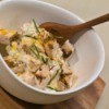 A bowl of chicken salad made with rosemary.