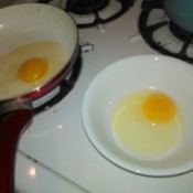Crack Eggs into Separate Bowl - egg in a bowl ready to fry
