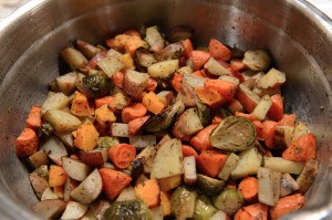 Herb Roasted Brussels Sprouts, Sweet Potatoes and Carrots in bowl