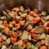 Herb Roasted Brussels Sprouts, Sweet Potatoes and Carrots in bowl