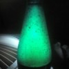 DIY Lava Lamp - lamp appearing green with bubbles inside bottle