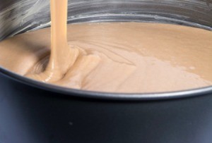 Bark baking pan being filled with batter.