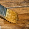applying varnish to wood