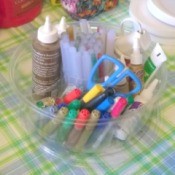 Recycled Fruit Container for Craft Supplies - clear plastic container filled with craft supplies