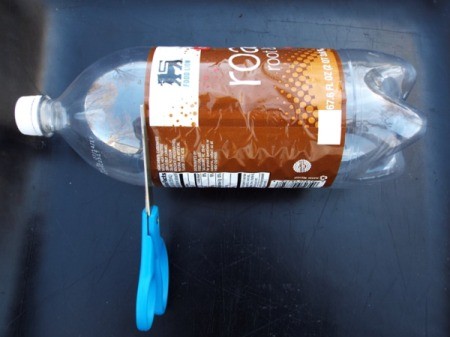 Mini Greenhouse From Soda Bottles - finish cutting bottle in two using scissors