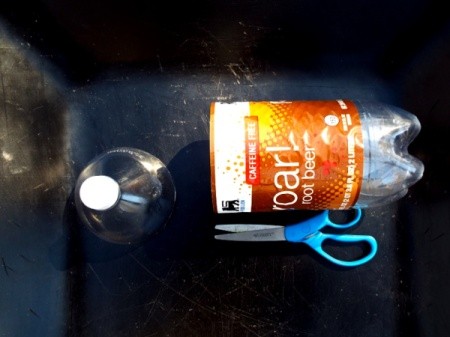 Mini Greenhouse From Soda Bottles - top portion removed