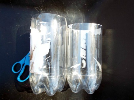 Mini Greenhouse From Soda Bottles - bottles have been cut