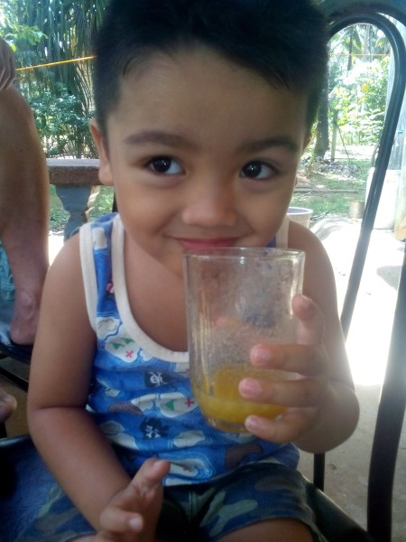 boy drinking smoothie