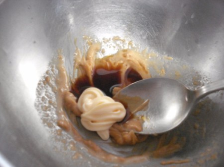 mixing asparagus salad dressing