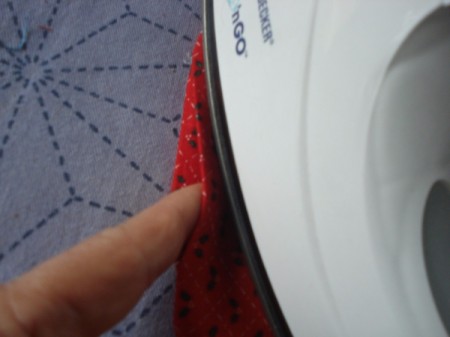 Pot Holders from Shoulder Pads - ironing edges